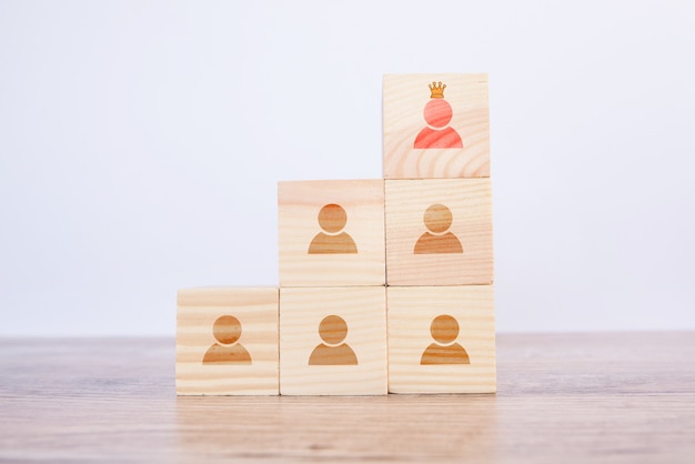 Photo human resource management and recruitment business concept. wooden cube with human icon symbol