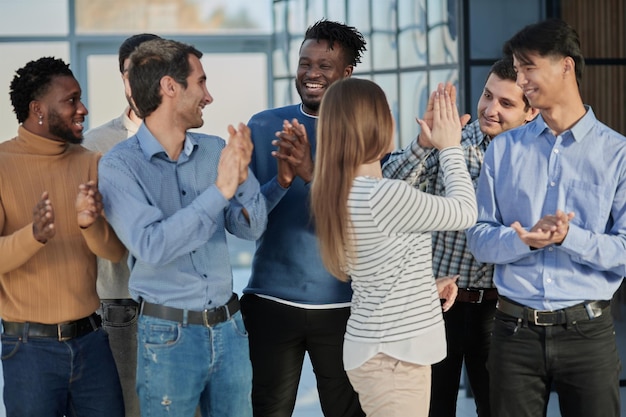 Human resources group portrait of smiling employees of a friendly team of different racial genders s