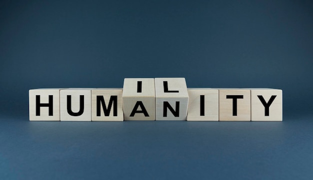 Photo humility and humanity cubes form the expression humility  humanity religion and spirituality concept