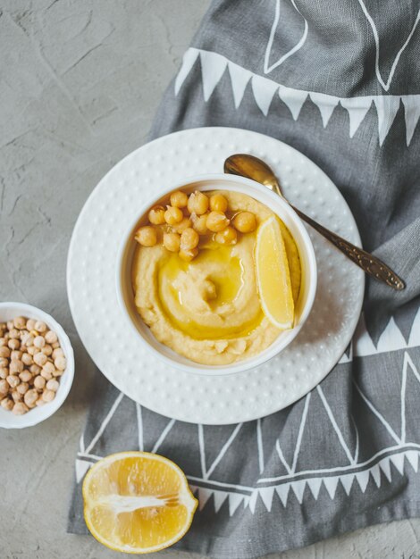 Hummus from chickpeas with olive oil and lemon