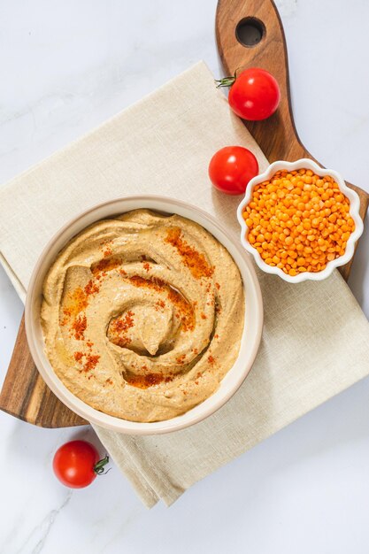 https://img.freepik.com/premium-photo/hummus-pate-pasta-dip-lentils-daal-red-lentils-lentil-hummus_80373-2274.jpg?size=626&ext=jpg