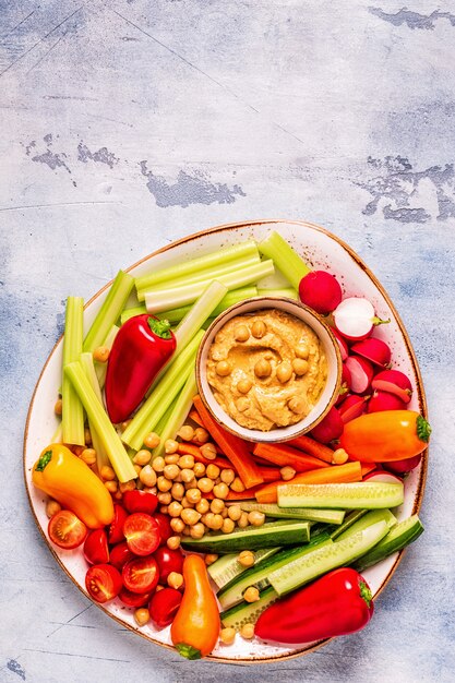 Hummus with various fresh raw vegetables