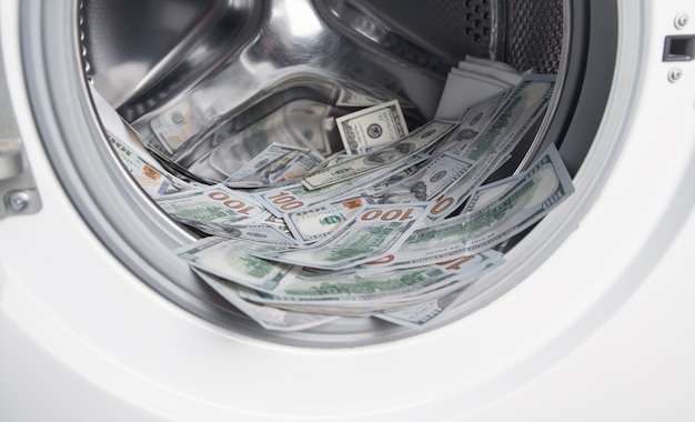 Photo hundred dollars in a washing machine