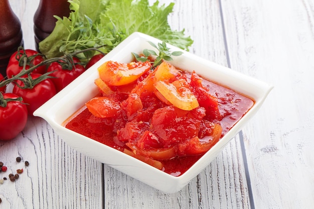 Hungarian lecho with tomato and paprika in sauce