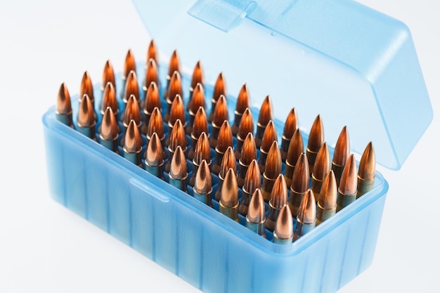 Hunting cartridges in a plastic box. Bullet storage box.