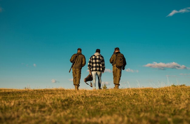 Photo hunting without borders hunting gear and hunting clothing hunter with shotgun gun on hunt