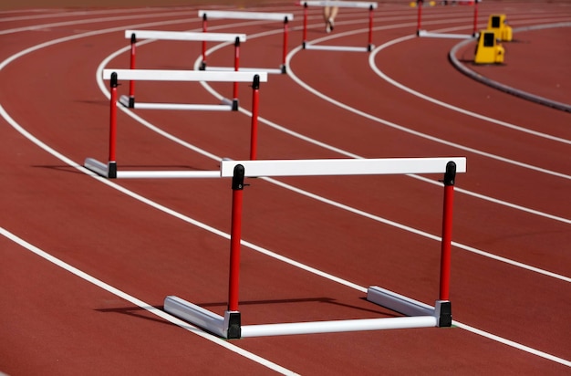 Hurdles on competition background