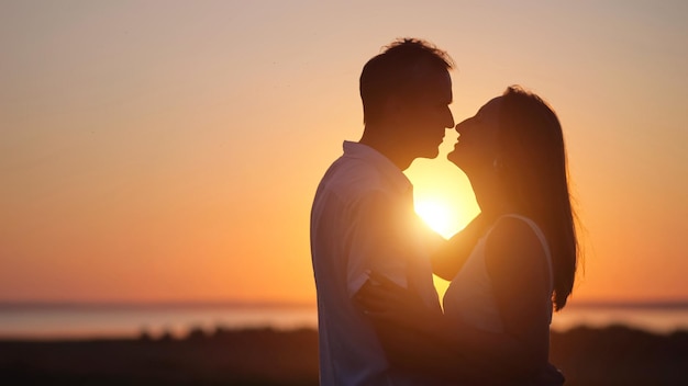 Husband expresses true love to gorgeous lover at back sunset