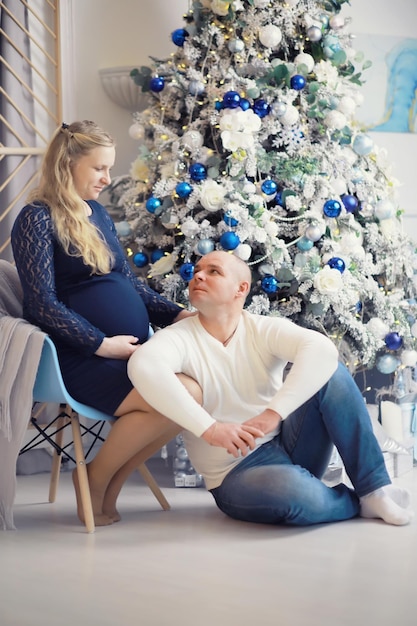 Husband and wife are expecting children Young family couple pregnancy A woman with a big belly