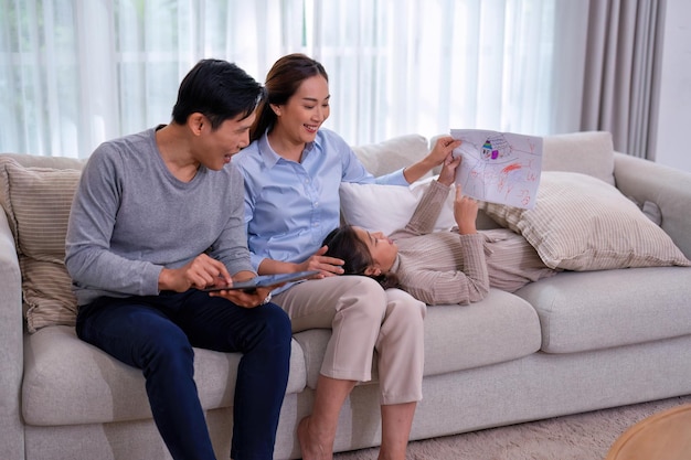 Husband and wife family in the leaving room happy talking