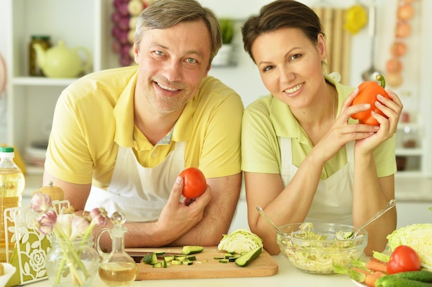 The husband and wife in the kitchen