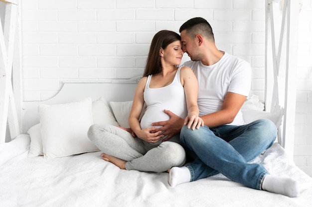 Husband and wife staying together in bed