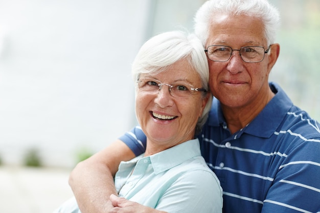 Husband and wife together for life Shot of a happy senior couple smiling at the camera