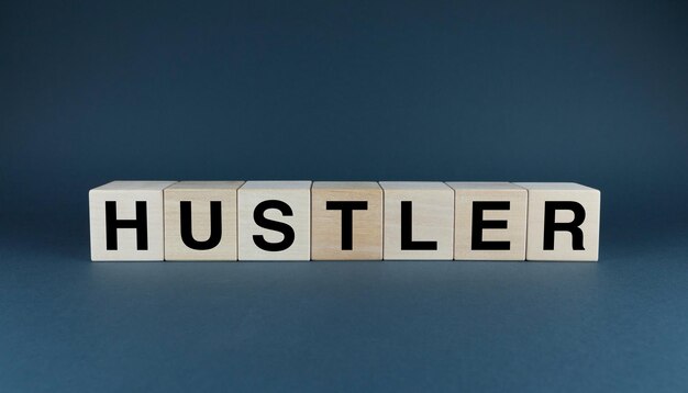 사진 hustler 큐브는 hustler라는 단어를 형성합니다. hustler라는 단어의 광범위한 개념