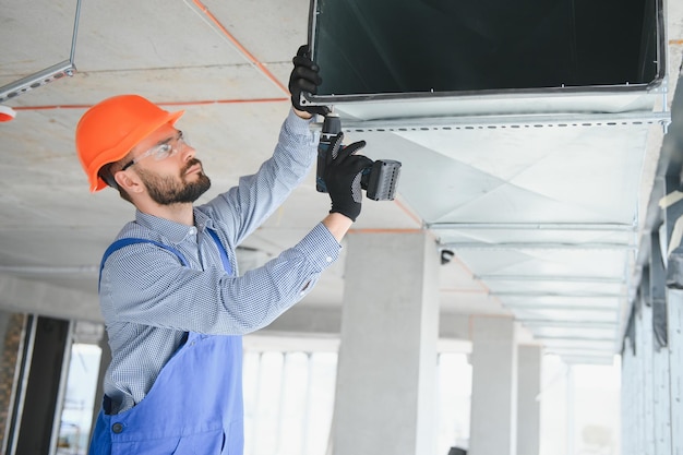 Photo hvac engineer install heat recovery ventilation system for new house copy space