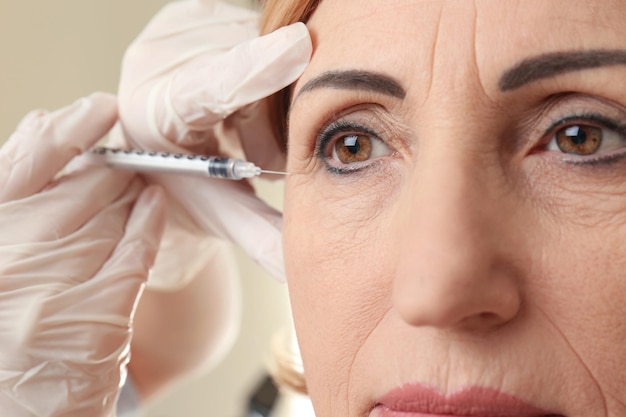 Hyaluronic acid injection for facial rejuvenation procedure