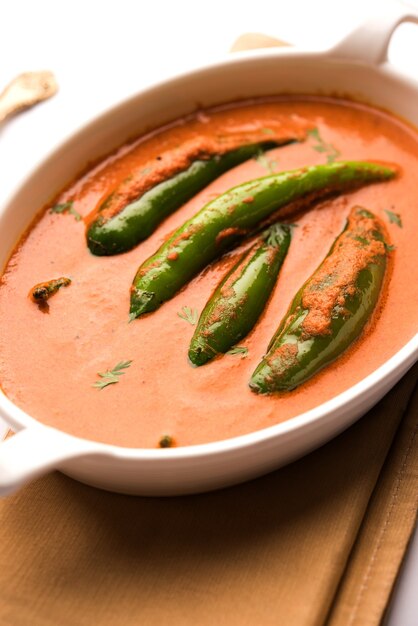 Hyderabadi mirch, mirchi ka Salan or green chilly sabzi or curry. Main course recipe from India. served in a bowl. selective focus