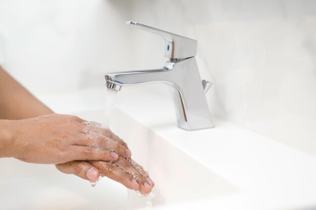 Hygiene Cleaning Hands Washing hands with soap under the faucet with water Pay dirt