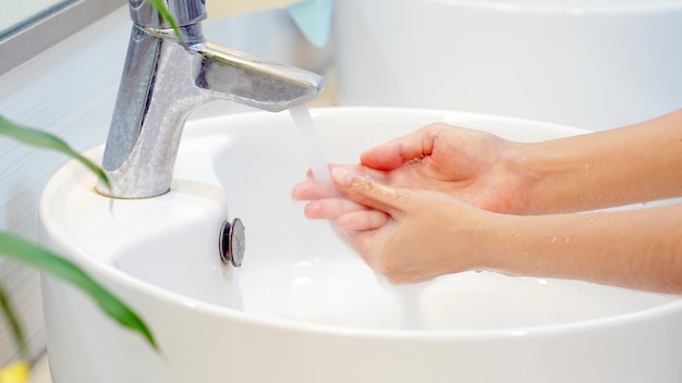 Hygiene concept Wash your hands with soap in the sinkfor covid19 prevention hygiene to stop spread