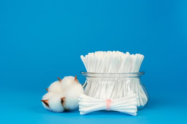 Hygienic cotton ear buds in glass cup