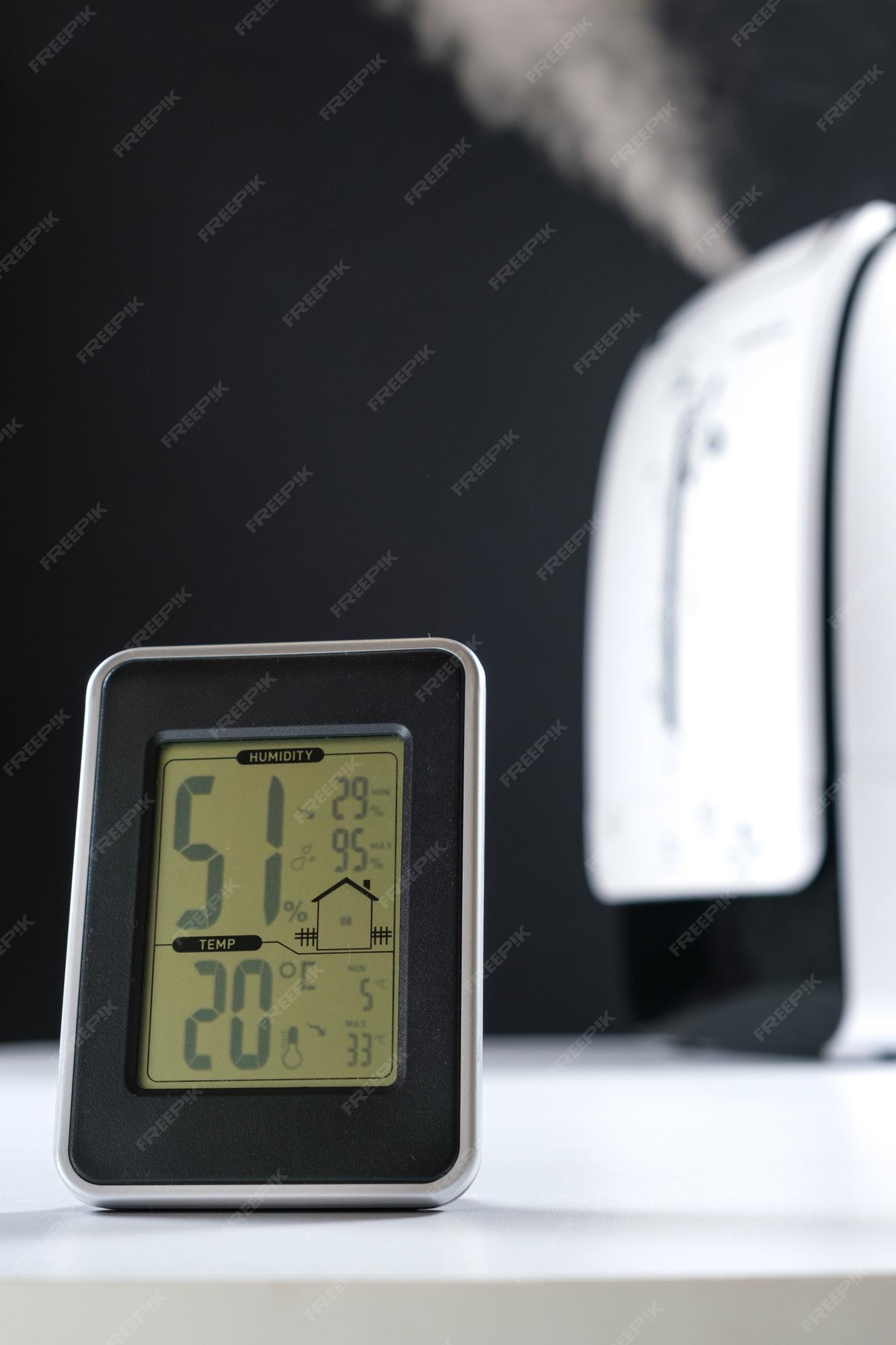 Premium Photo  Hygrometer and thermometer with humidifier