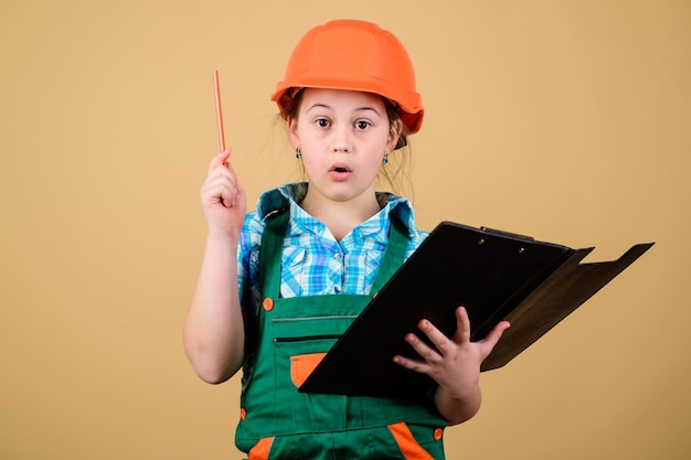 I have an idea Safety expert Future profession small girl repairing in workshop Child care development Builder engineer architect Kid worker in hard hat Foreman inspector Repair great idea