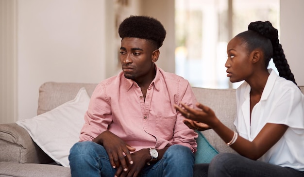 I know that she deserves better Cropped shot of a young couple arguing while sitting on the couch at home