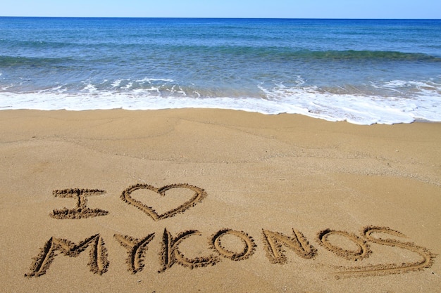 I Love Mykonos written on sandy beach