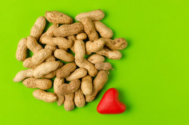 I love peanuts nuts on a bright green background