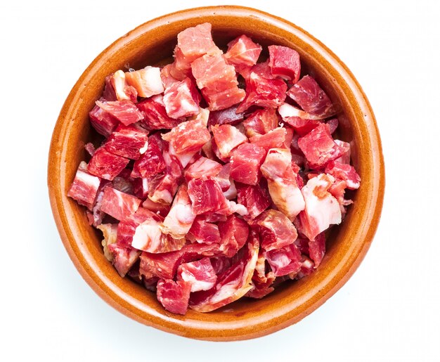 Iberian ham cut into cubes in a bowl