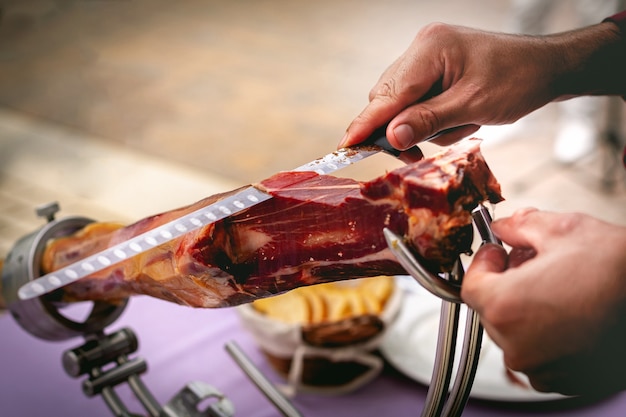 Iberian ham cutter at an event