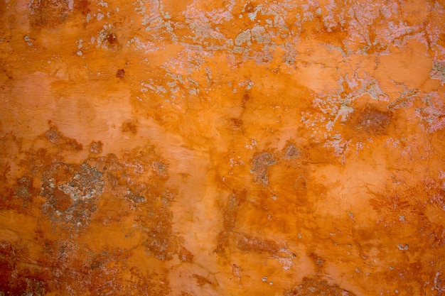 Ибица средиземноморской стены текстуры в оранжевом бетоне