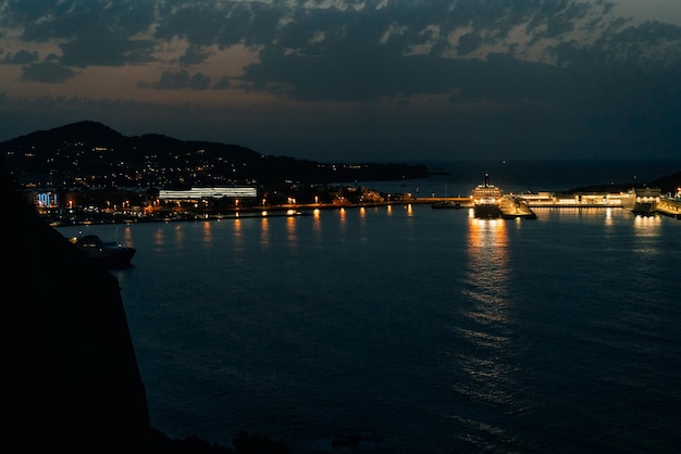 Ibiza Spain aerial view of the marina and yachts om the sunset