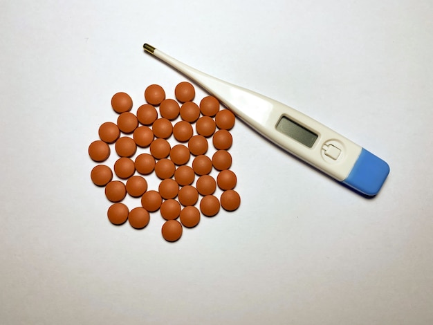 Ibuprofen and an electronic thermometer for measuring temperature