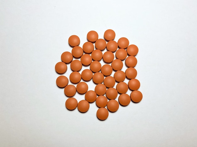 Ibuprofen to reduce high body temperature Ibuprofen is red on a white isolated background