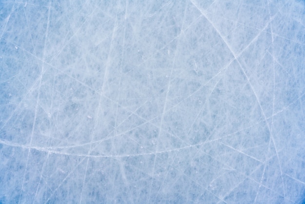 스케이트와 하키, 흠집 링크 표면의 파란색 질감에서 마크와 얼음 배경