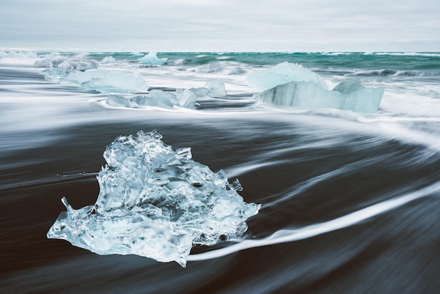 Ice on the beach with black sand in Iceland