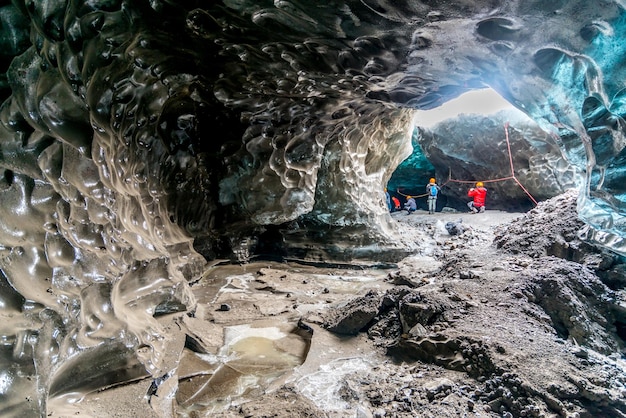 Ice cave located beneath glacier among ice mountain in Iceland it is mesmerizing landmark