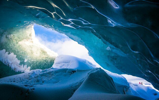 Ice cave of snowcapped landscape