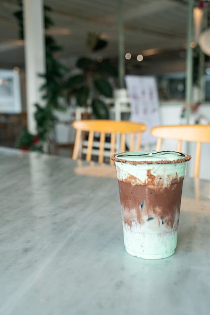 ice chocolate mint milkshake glass on table