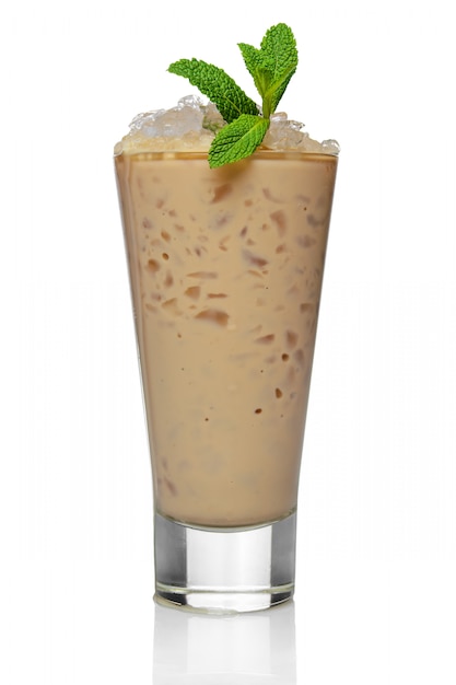 Ice cocktail with baileys in highball glass isolated on white