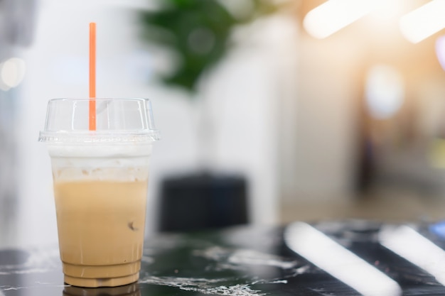 Ice coffee on table.  Drink in menu at coffee shop