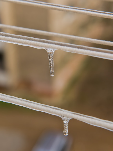 Ice-covered clothesline with icicles.