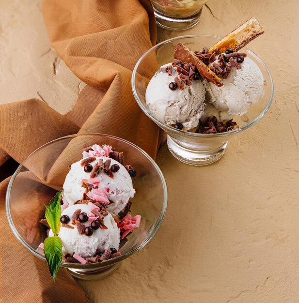 Ice cream balls in a transparent glasses