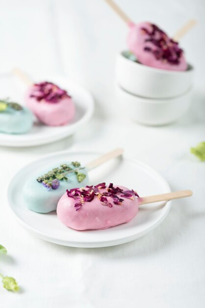 Ice cream bars with pink and green topping