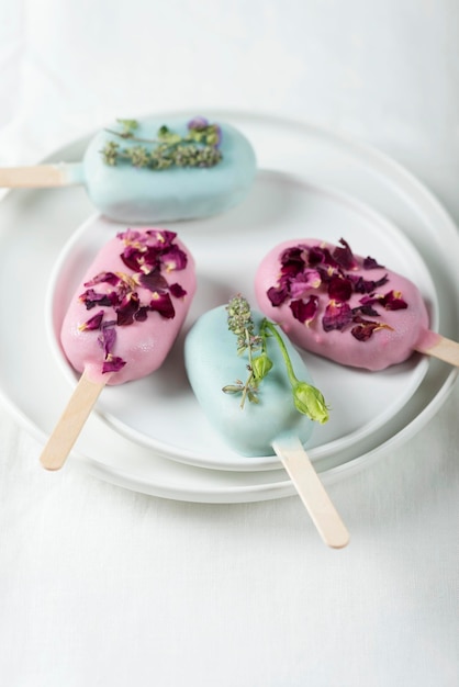 Ice cream bars with pink and green topping