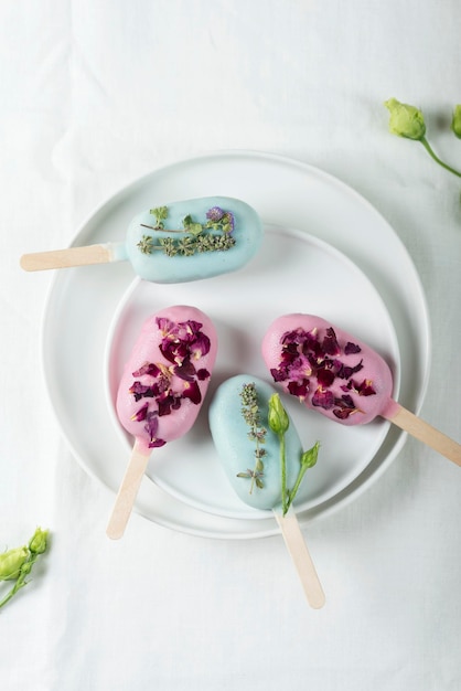 Ice cream bars with pink and green topping