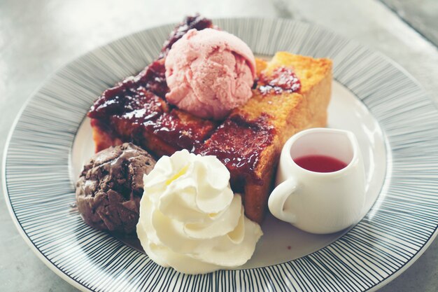 Ice cream, bread and strawberry jam