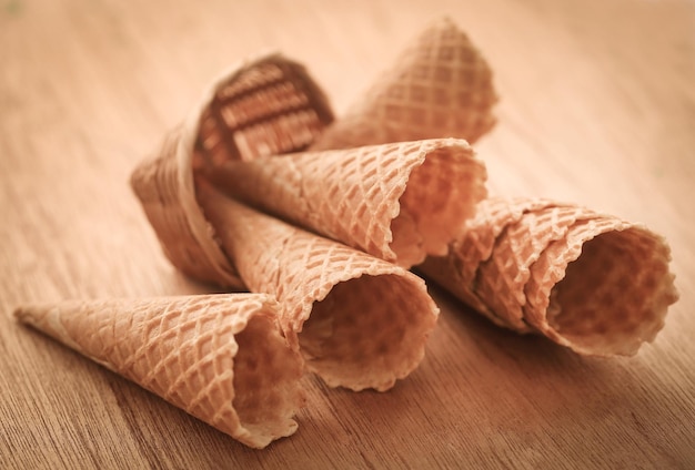 Ice cream cone on timber surface