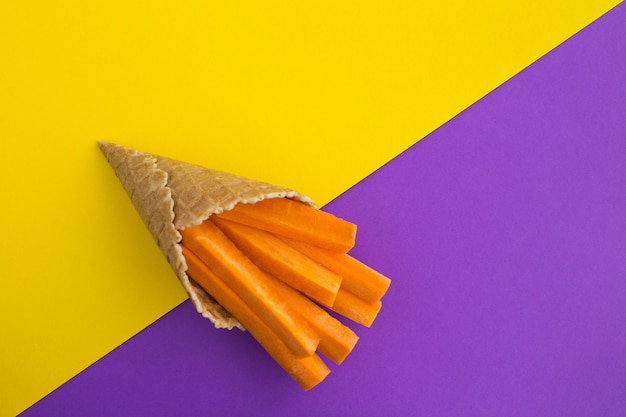 Photo ice cream cone with sliced carrots